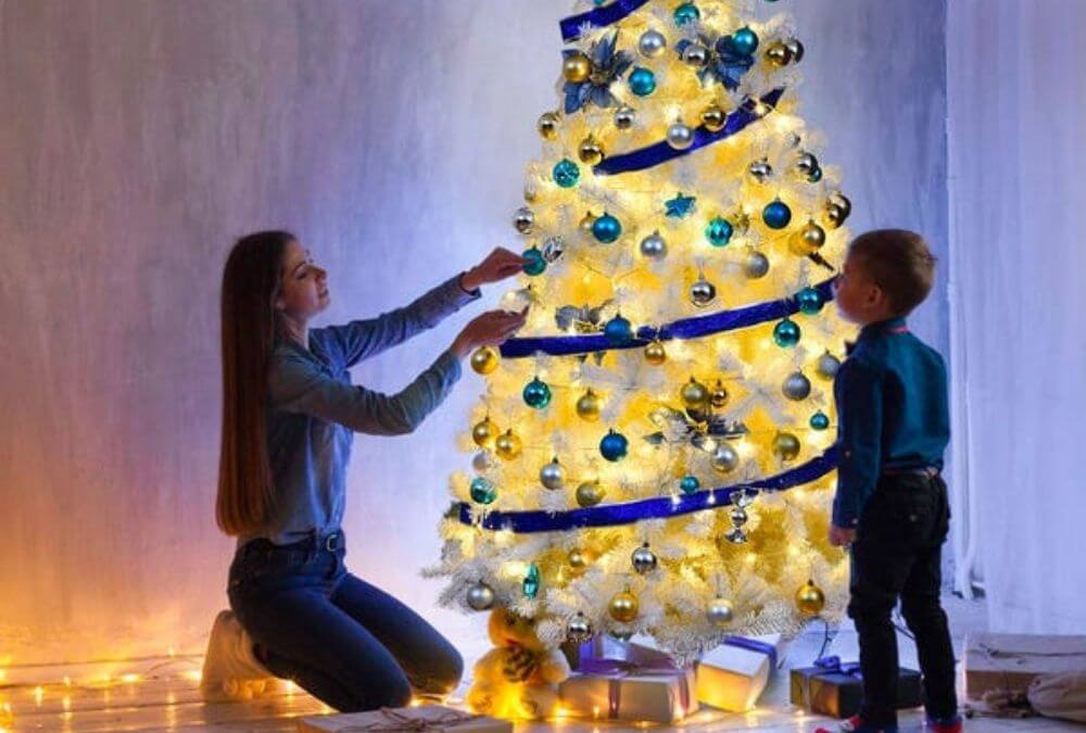 A white Christmas Tree embellished with Lights
