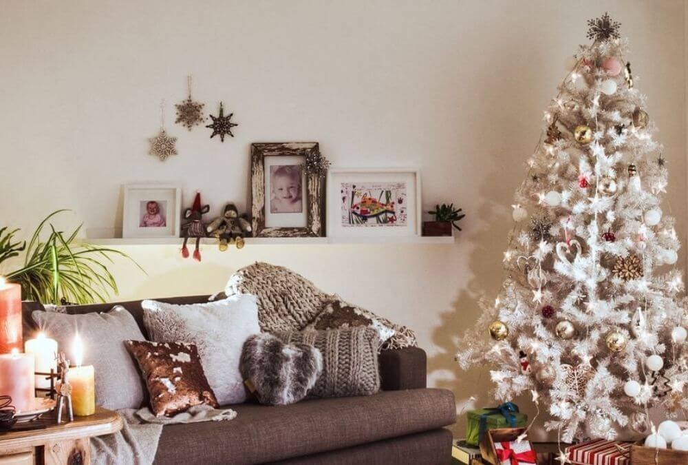 A white Christmas Tree with so many accessories