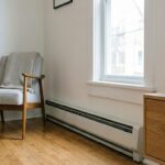 A clean baseboard heaters in a modern living room.