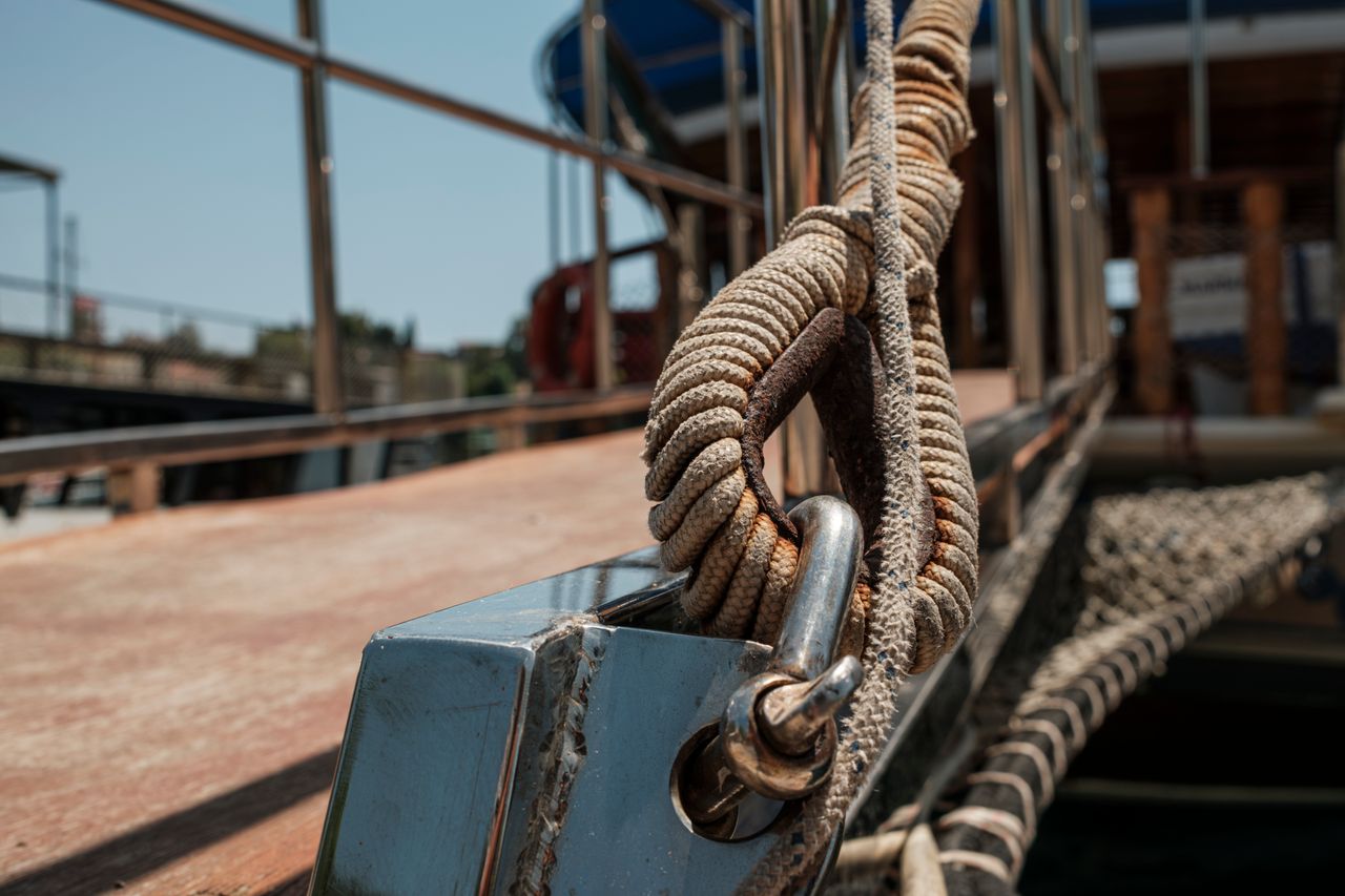 Heavy duty stainless d ring and rope secured on a boat deck
