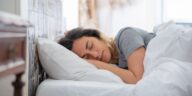 when can i sleep on my side after tooth extraction