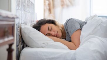 when can i sleep on my side after tooth extraction