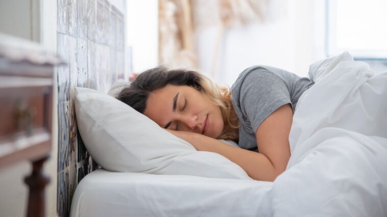 when can i sleep on my side after tooth extraction