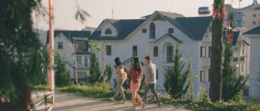 Modern neighborhood representing j society with connected homes and green spaces.