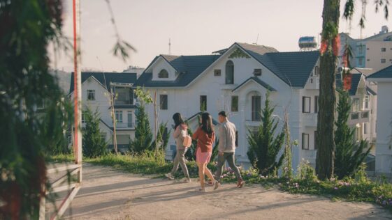 Modern neighborhood representing j society with connected homes and green spaces.