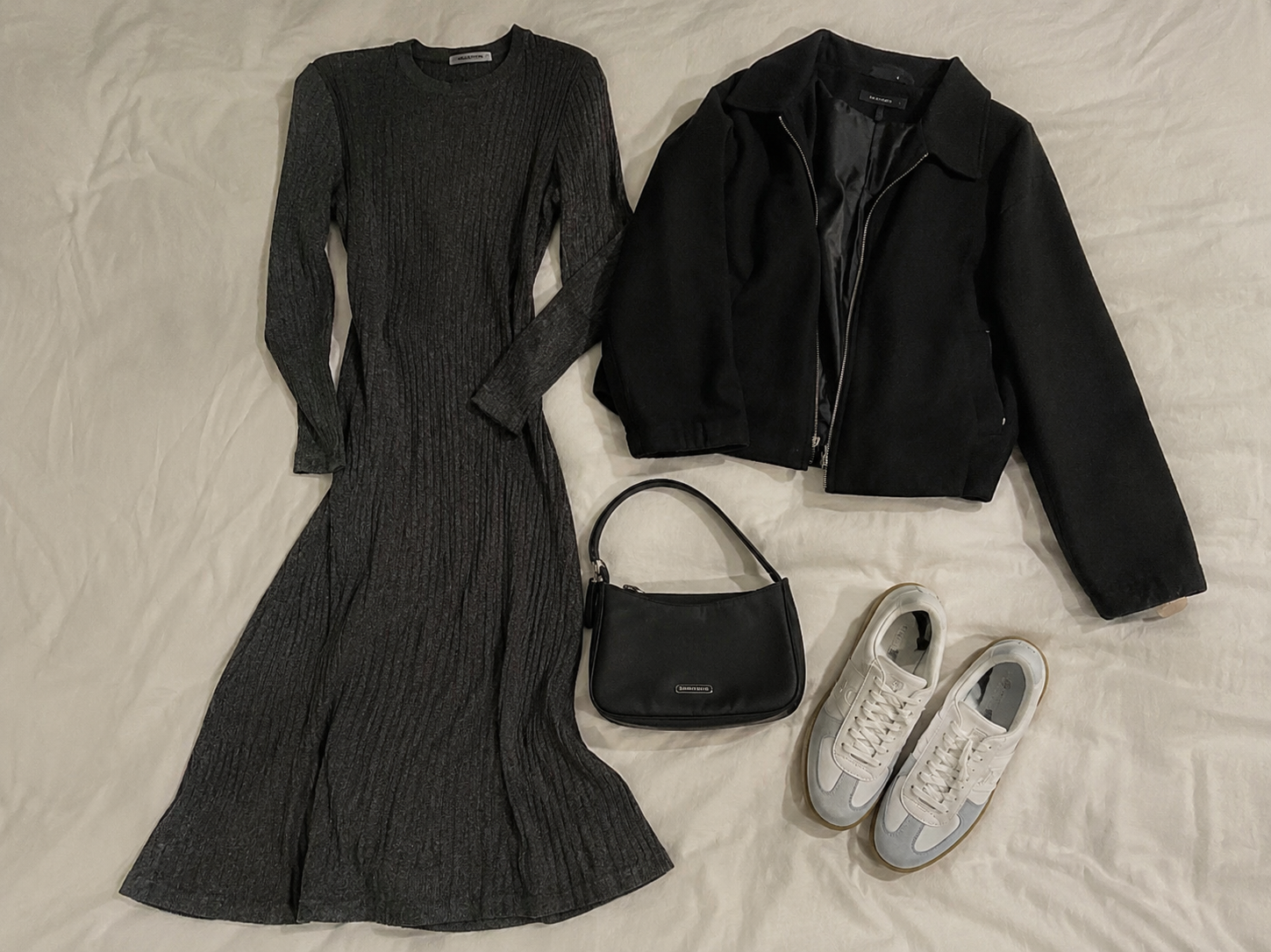 Boho dress styled with a denim jacket and ankle boots.