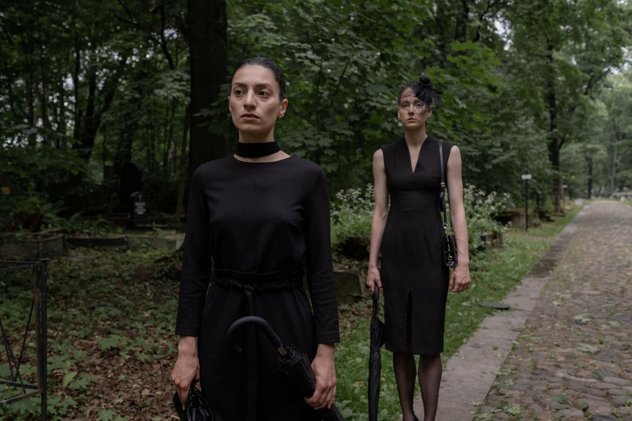 woman's dress cord at funeral