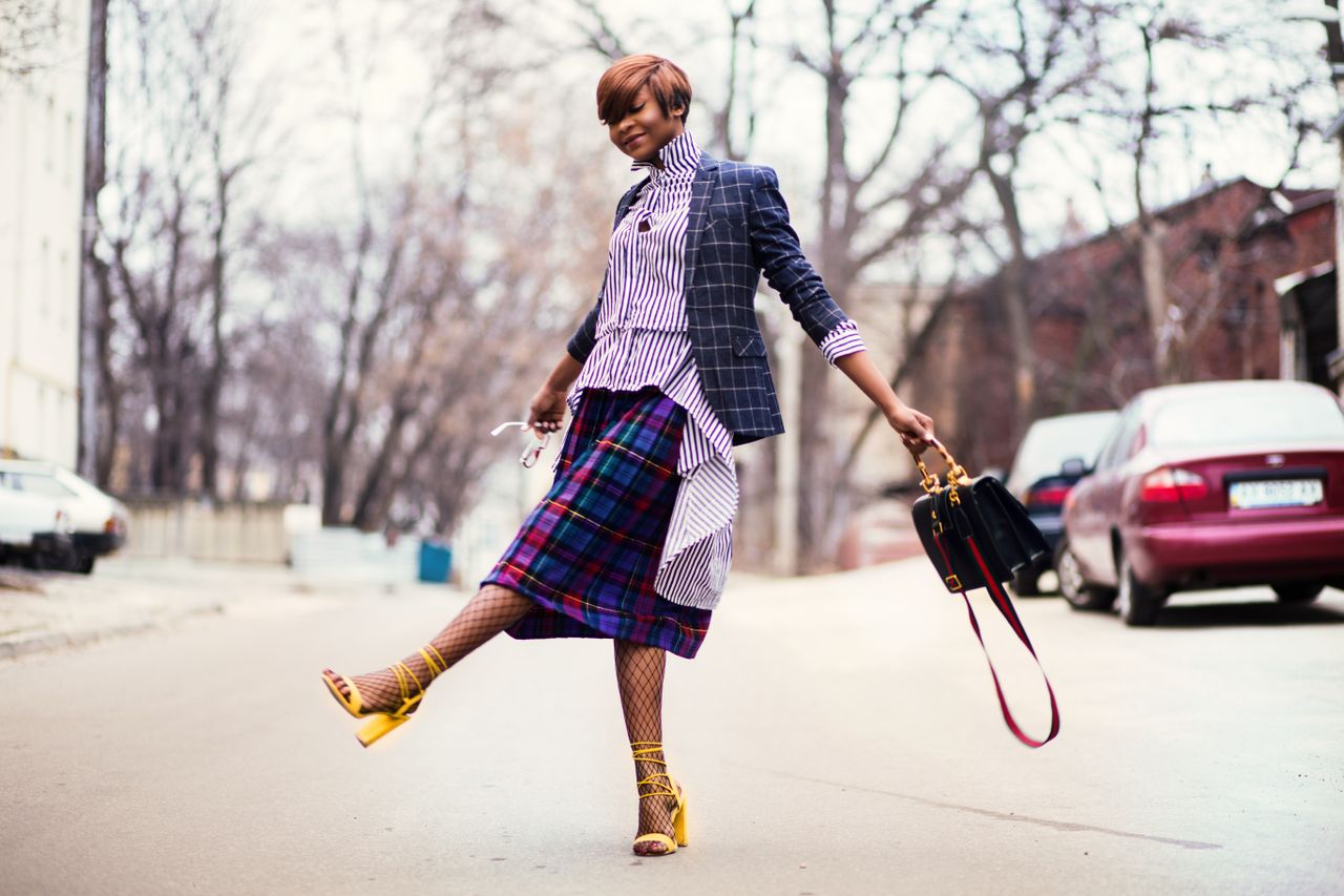 woman wearing a sweatshirt skirt