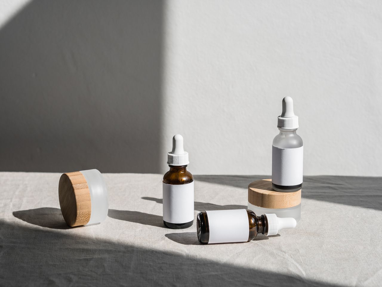skincare bottles laid out on a table