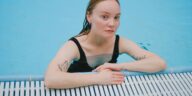 how long after getting a tattoo can you swim