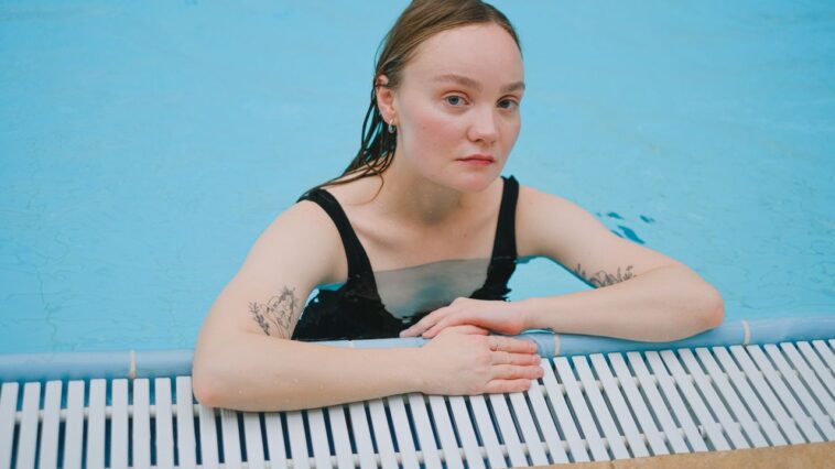 how long after getting a tattoo can you swim